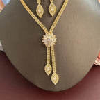 A three piece jewelry set with exquisite patterns and stunning necklaces and earrings, perfect for parties and banquets