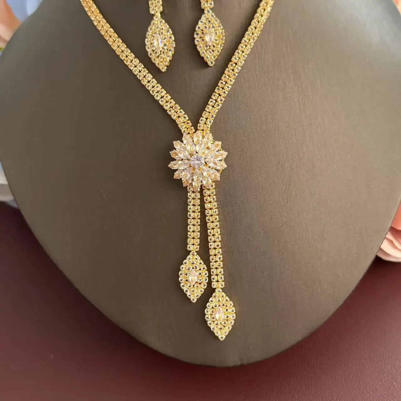 A three piece jewelry set with exquisite patterns and stunning necklaces and earrings, perfect for parties and banquets
