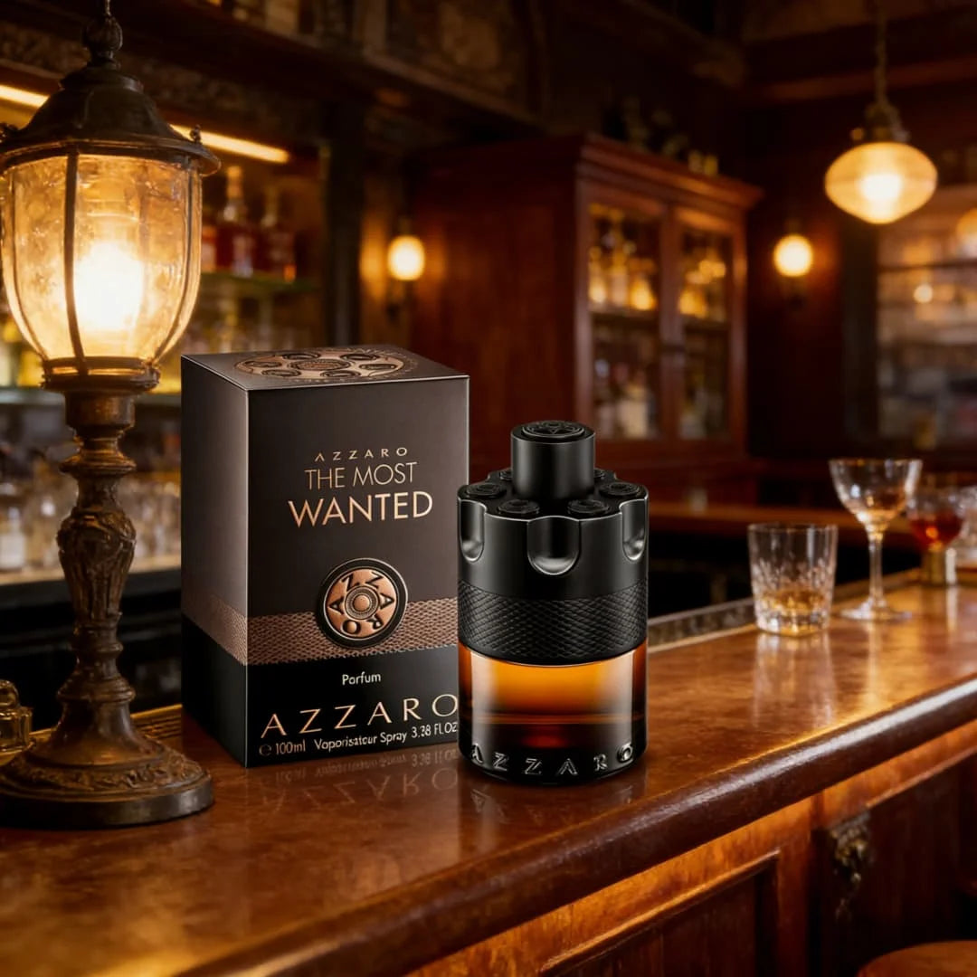 Azzaro The Most Wanted Parfum | Black-gold gun design, tobacco-amber notes, maximum longevity