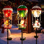 Outdoor Garden Solar Stake Light, Garden Iron Christmas Statue Light, Garden Solar Christmas Iron Santa Claus Sitting on a Hot Air balloon with Bells and Lights Inserted, for Yard Pathway Christmas Home Decor