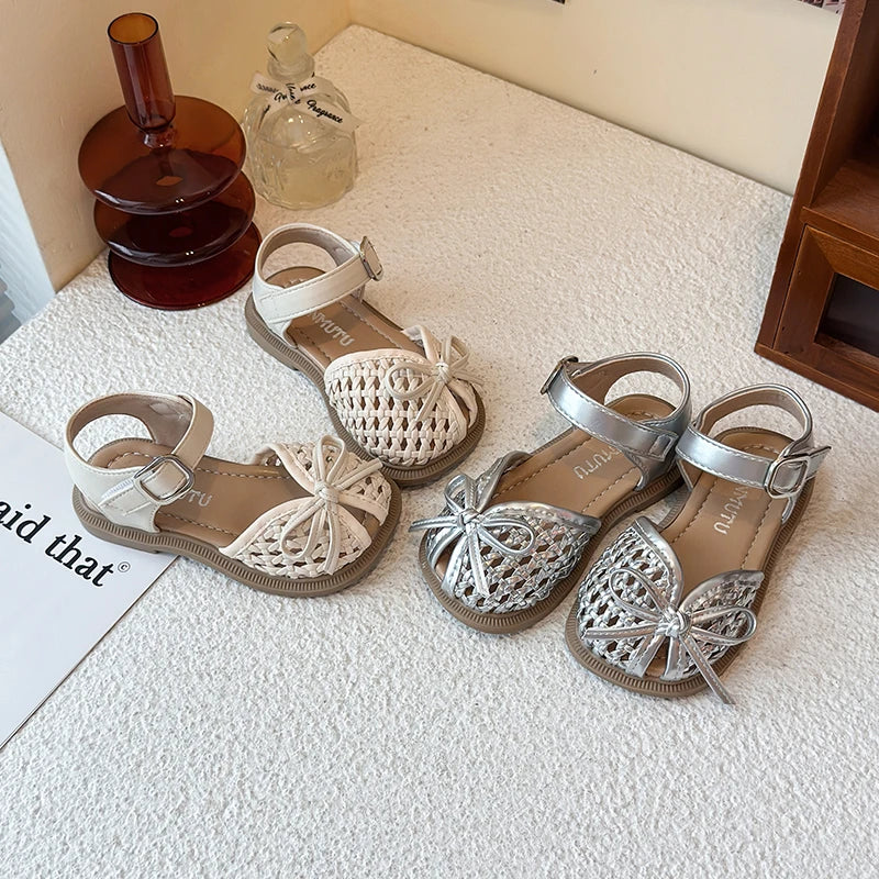 Summer girls' sandals 2026 new summer style with toe caps for girls, soft soles, baby woven and hollowed-out trendy