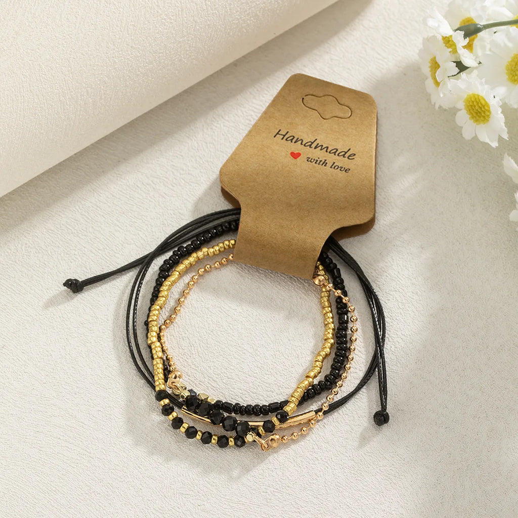 New Fashion 4Pcs/Set Vintage Black Hand Bracelet With Hand-Woven Beaded Simple Women Fine Popular Jewelry Accessories Wholesale