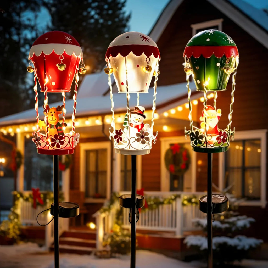Outdoor Garden Solar Stake Light, Garden Iron Christmas Statue Light, Garden Solar Christmas Iron Santa Claus Sitting on a Hot Air balloon with Bells and Lights Inserted, for Yard Pathway Christmas Home Decor