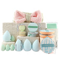 Multi-piece set of beauty tools, blue hair with water droplets, powder puff, skin-friendly, soft makeup brush, complete set