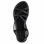 Black braided sandal on white background