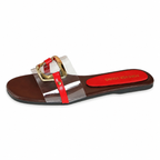 Red accent clear strap sandal on white background